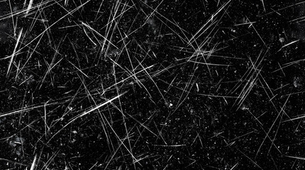 Grungy black texture with white scratches, distressed vintage film overlay, dark weathered surface with heavy scuff marks and dust particles © graphixlift