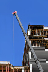 Black boom of mobile crane and construction © Unkas Photo