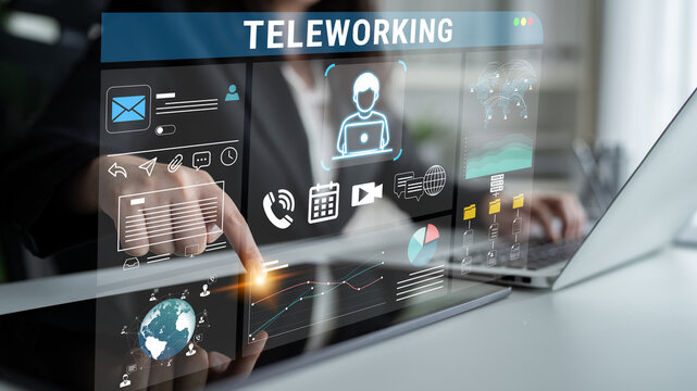 A business professional engaged in teleworking interacts with a digital interface, showcasing remote collaboration tools and modern technology in a productive work environment. Nascent