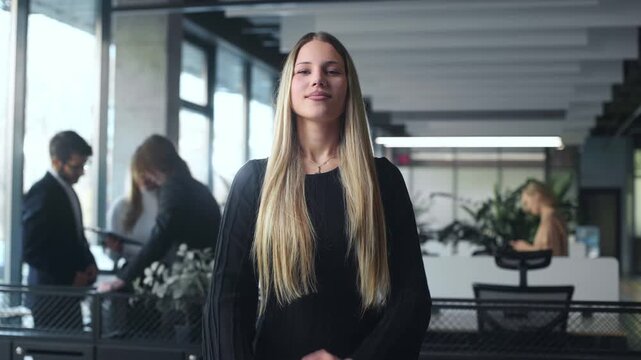 Young businesswoman and her colleagues	