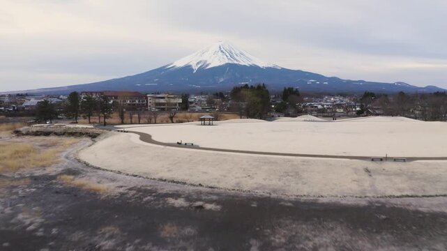 Telephoto View of Mount Fuji Across Lake Kawaguchiko Shoreline and Sandbar