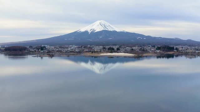 Symmetrical Reflection of Mount Fuji and Lake Kawaguchiko at Sunrise Aerial View