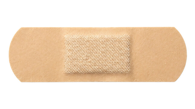 Tan adhesive bandage strip for medical wound care and first aid protection on human skin