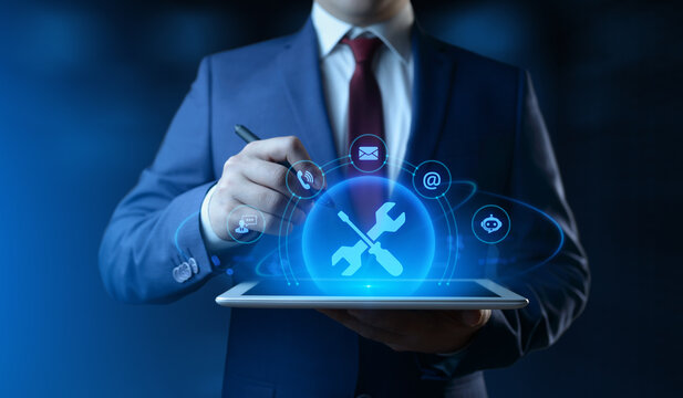 Businessman Holding tablet with Technical Support Icons on Screen. Customer Service and Support concept