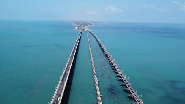 Pamban Railway Bridge and Road Bridge Over Ocean Waters in Rameswaram. Drone View of Dangerous Sea Railway Bridge Parallel to Highway Bridge over Palk Strait. Historic Indian Bridge Over Ocean.