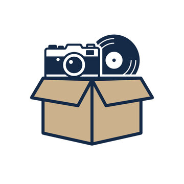 Cardboard box containing camera and vinyl record disc