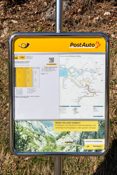 PostAuto sign showing the public transport network in Switzerland.
