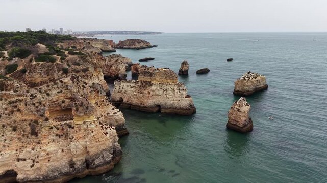 Aerial view of three brothers beach in alvor, portugal