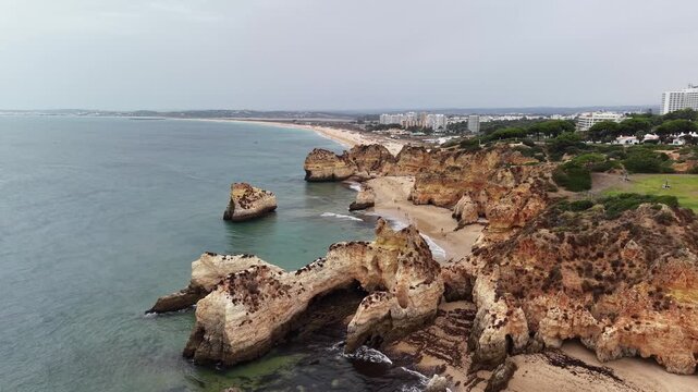 Aerial view of tr&ecirc;s irm&atilde;os beach coastline in alvor portugal