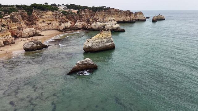 Scenic aerial view of three brothers beach in portugal