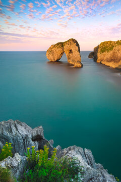 Castro de las Gaviotas islet located off the coast of Llanes, Asturias, Spain