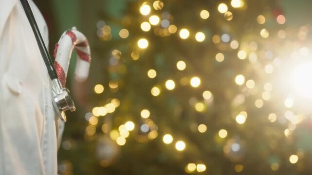 Doctor Wishes His Patients a Merry Christmas Copy Space With Tree Background