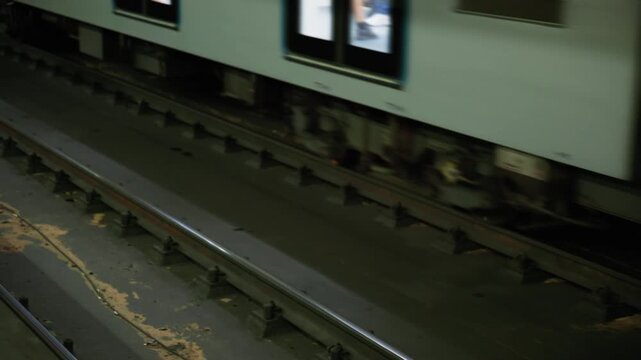 Arrival of a modern Naples metro train at the station