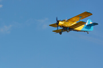 Plane spraying mosquitoes from above the beach in the Neptun resort on the Black Sea © Marius Burcea