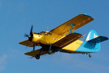 Plane spraying mosquitoes from above the beach in the Neptun resort on the Black Sea © Marius Burcea