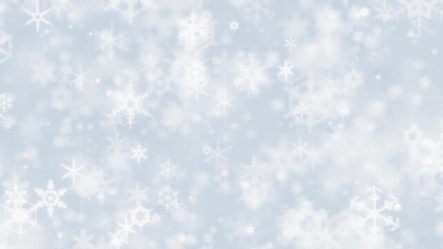 Bright winter scene of glowing sparkling snowflakes. White background with twinkling snow flakes creating wintry atmosphere. Soft snowflakes for winter or Christmas backgrounds.
