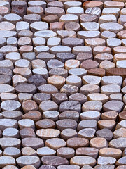Naturstein-Textur aus dicht angeordneten Kieselsteinen © RS Visuals