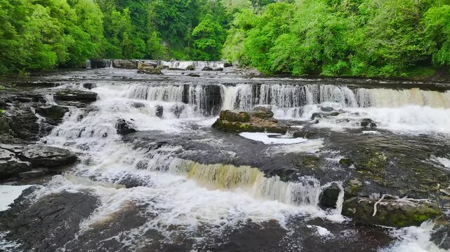 Aysgarth Falls on River Ure from a drone, Yorkshire Dales National Park, North Yorkshire, England, United Kingdom
