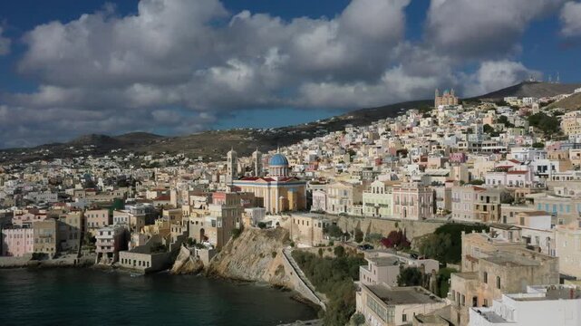 Aerial view, picturesque coastal town with historic buildings and a church, Ermoupoli, Syros, Greece