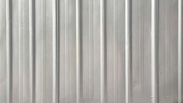 Widescreen corrugated galvanized iron wall texture with vertical ribbed pattern