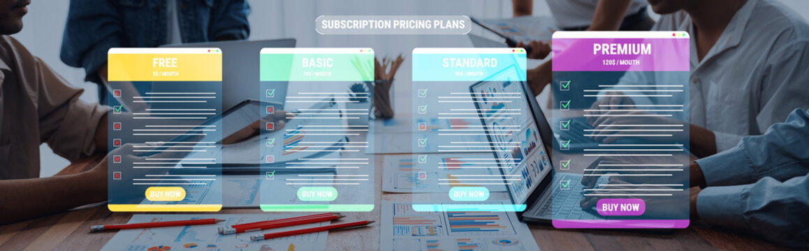 Colorful Subscription Pricing Plans on Digital Screens Showcasing Free, Basic, Standard, and Premium Options for Online Services and Products. Glyphic.