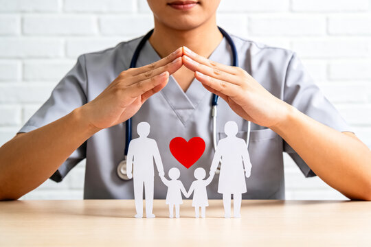 Doctor Protecting Family Health with Care and Support