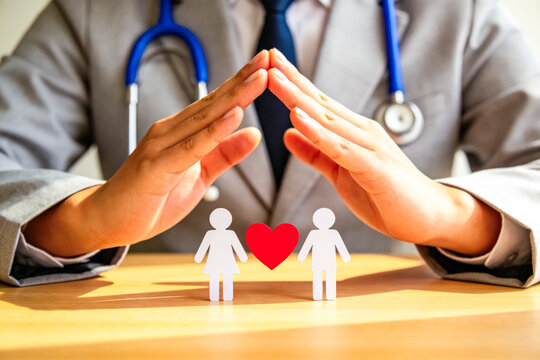 Doctor Providing Care and Protection to Couple and Their Health