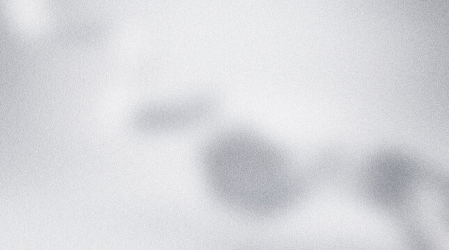 Abstract Grainy Texture Background with Soft Blurred Dark Shapes on Light Gray Field