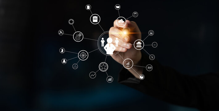 A concept of centralized business management and corporate strategy. A leadership team connecting to all functions like finance, operations, and planning. Motif