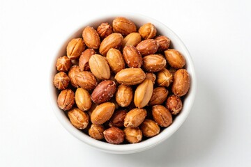 Fototapeta premium White bowl filled with roasted peanuts on plain background. Crunchy salted nuts serve as healthy protein snack organic food ingredient. Close up top view shows brown legume seeds for cooking,