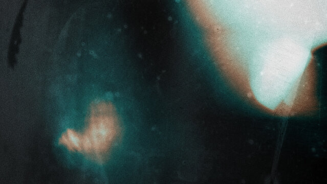 retro film overlay effect with scratch dust and light leaks, retro grain noisy film distressed texture light leak flare on black background