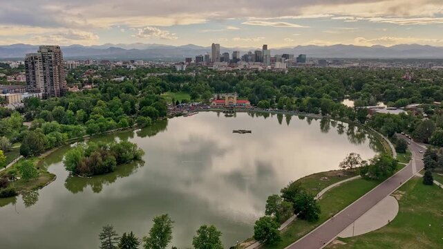 Denver city park outdoor concert with denver skyline and mountains afternoon drone video 4K