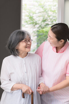 Home care staff who assist elderly people who use canes with walking; home health aides who provide walking assistance, mobility support, fall prevention, and in-home care