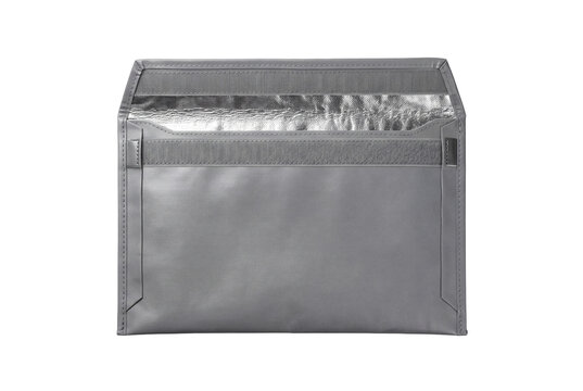 Gray signal blocking faraday bag with open flap and silver lining isolated on transparent background
