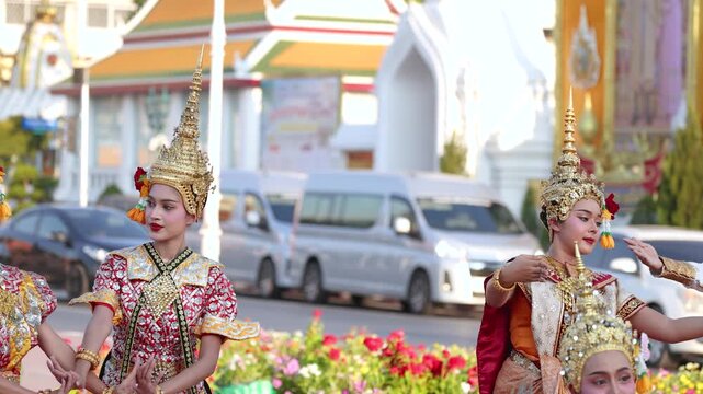 Traditional Thai Khon Dancers Perform in Front of Wat Suthat Temple