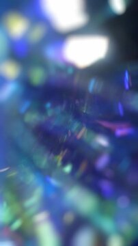 Christmas glowing background. Colorful motion abstract pink purple blue light
