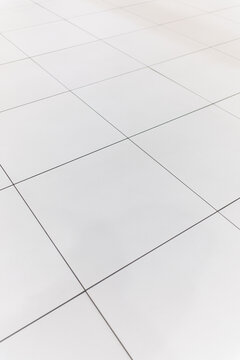 遠近感のある白いタイル床の幾何学背景
