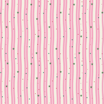 Seamless Christmas pattern with cute green stars and pink vertical stripes on pastel background. Vector illustration for winter holiday fabric textile print, wrapping paper, and greeting cards.