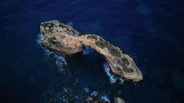 Travel and nature aerial footage of Es Pontas arch, Mallorca. Top view, nature. Landmark s in Mallorca
