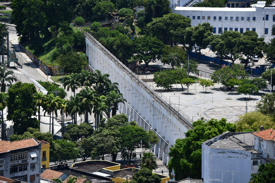The Arcos da Lapa in Rio de Janeiro, showcasing its historic architecture and revealing the famous white aqueduct that defines the city's urban and cultural landscape.