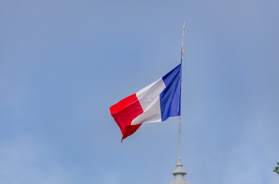 Flag of France featuring its three vertical stripes blue, white, and red symbolizing national identity, history, and French culture in a clear, elegant composition.