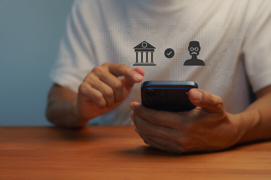 Man using smartphone for mobile banking and digital identity verification. Secure online transaction, user authentication profile concept, internet finance and global business.