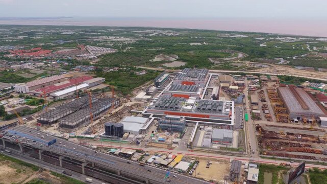 Aerial drone footage capturing the construction of a large scale hyperscale data center, a vital infrastructure for ai and cloud computing