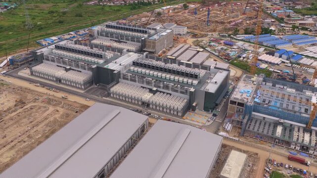 Aerial view of a large scale data center under construction. This massive hyperscale facility supports ai and cloud computing technology