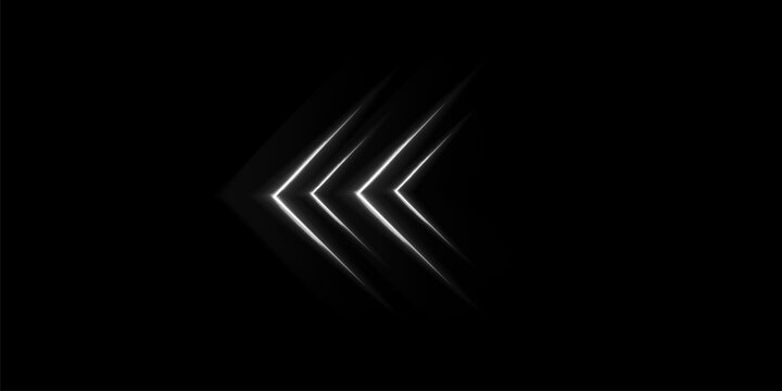 Abstract white Glowing Left Arrow Chevrons With Motion Blur On Dark Technology Background.