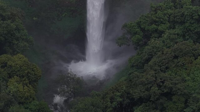 Aerial View of Barki Waterfall Amid Lush Green Forest Kolhapur Maharashtra
