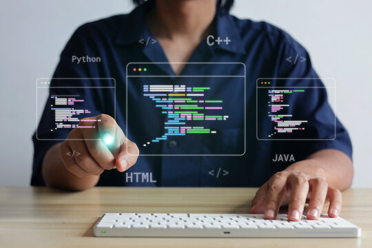 Male Touching Hologram Programming Code Windows while Typing on Keyboard