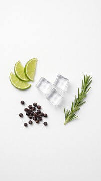 Gin Tonic Ingredients Flat Lay With Lime Ice Rosemary And Juniper