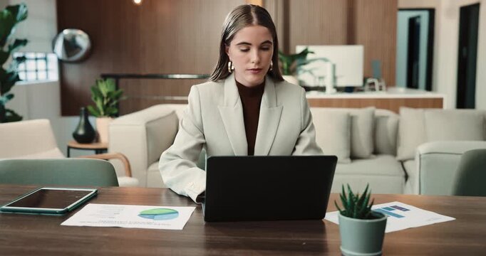 Business, woman and typing in office with laptop, research and data analysis for revenue growth. Female person, email and documents in workplace with pc, pie chart and finance stats of company profit