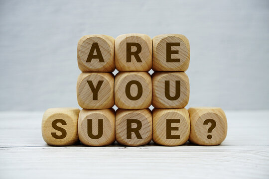 Are You Sure? alphabet letters on wooden background